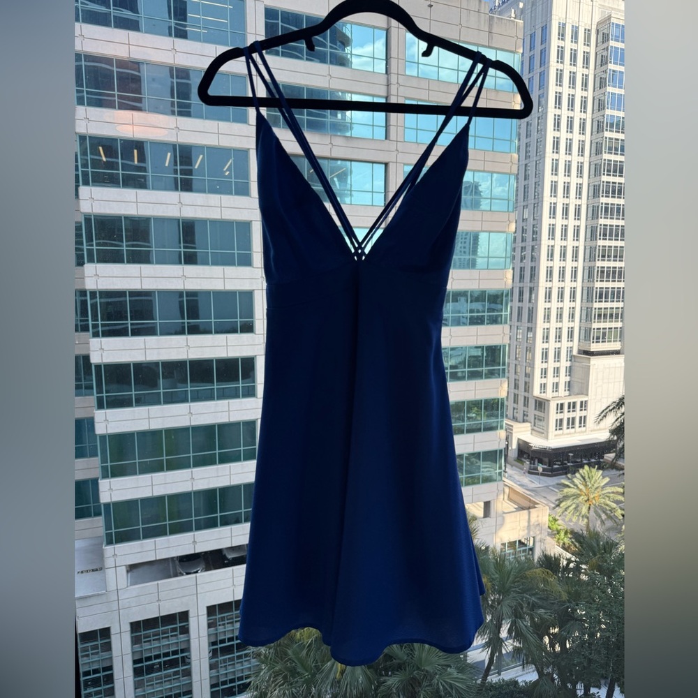 Such a fun dress.... really cute with the straps that cross.